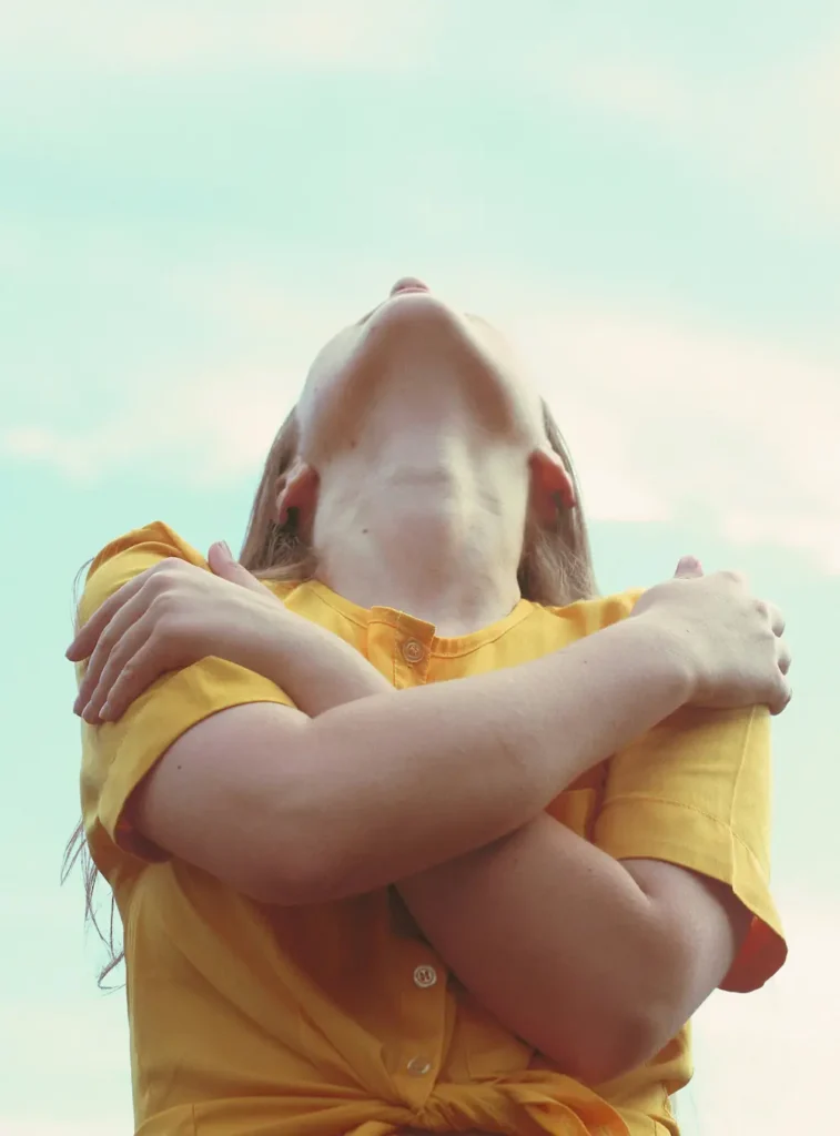 self-acceptance Woman hugging herself